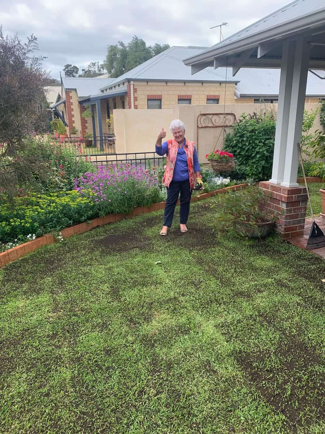 Happy client in their restored garden